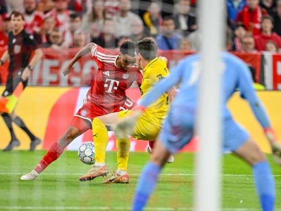 Jamal Musiala (FC Bayern Muenchen), Fredrik Bjorkan (FK Bodo Glimt) and Torwart Nikita Haikin (FK Bodo Glimt) battle for the ball during the UEFA Champions League 2026 2027 match between Bayern Muenchen and Bodo Glimt at Fussball Arena Muenchen on September 10, 2026 in Munich, Germany. (Photo by Harry Langer DeFodi Images) -