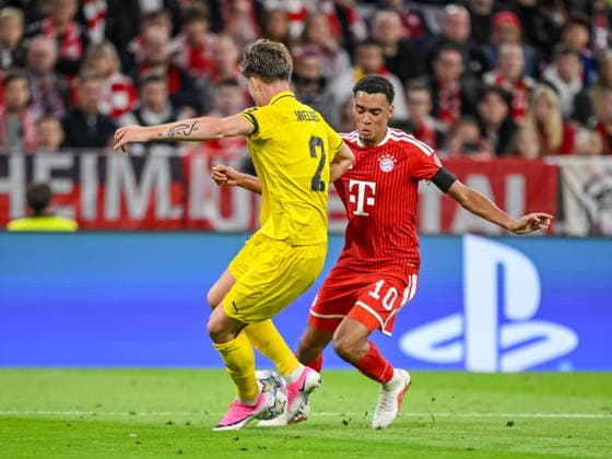 Villads Nielsen (FK Bodo Glimt) and Jamal Musiala (FC Bayern Muenchen) battle for the ball during the UEFA Champions League 2026 2027 match between Bayern Muenchen and Bodo Glimt at Fussball Arena Muenchen on September 10, 2026 in Munich, Germany. (Photo by Harry Langer DeFodi Images) -