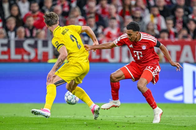 Villads Nielsen (FK Bodo Glimt) and Jamal Musiala (FC Bayern Muenchen) battle for the ball during the UEFA Champions League 2026 2027 match between Bayern Muenchen and Bodo Glimt at Fussball Arena Muenchen on September 10, 2026 in Munich, Germany. (Photo by Harry Langer DeFodi Images) -