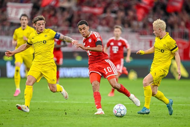 Patrick Berg (FK Bodo Glimt), Jamal Musiala (FC Bayern Muenchen) and Sondre Auklend (FK Bodo Glimt) battle for the ball during the UEFA Champions League 2026 2027 match between Bayern Muenchen and Bodo Glimt at Fussball Arena Muenchen on September 10, 2026 in Munich, Germany. (Photo by Harry Langer DeFodi Images) -