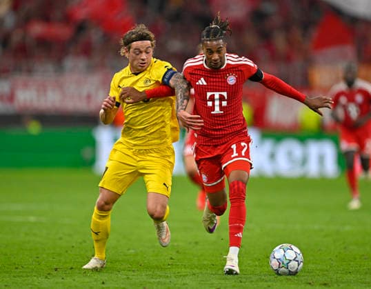 10.09.2026, Fussball UEFA Championsleague 2026 2027: 1.Spieltag, FC Bayern München - FK Bodo Glimt, in der Allianz-Arena München, v.l. Patrick Berg (FK Bodo Glimt) gegen Michael Olise (FC Bayern München)