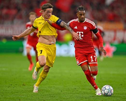 10.09.2026, Fussball UEFA Championsleague 2026 2027: 1.Spieltag, FC Bayern München - FK Bodo Glimt, in der Allianz-Arena München, v.l. Patrick Berg (FK Bodo Glimt) gegen Michael Olise (FC Bayern München)