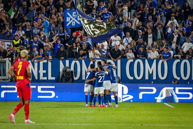 Italien: Fussball UEFA Champions League 2026 - 2027, 1. Spieltag - Como 1907 vs RB Leipzig - Giuseppe Sinigaglia (Como): Tor und Torjubel zum 2:0 durch Tasos Douvikas (Como 1907, 9) Freude, Emotionen, Jubel - Antonio Nusa (RB Leipzig, 7) Copyright: xJOERANxSTEINSIEKx