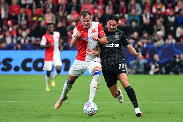 From left Tomas Vlcek of Slavia and Franjo Ivanovic of Lens in action during the Football Champions League opening round match Slavia Prague vs RC Lens on September 10, 2026, in Prague, Czech Republic. (CTKxPhoto MichalxKamaryt) CTKPhotoP2026091010311  CTKPhotoP2026091010311
