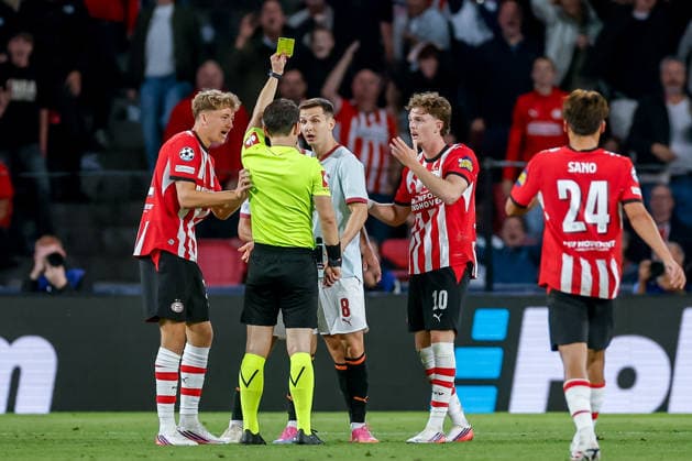 EINDHOVEN, NETHERLANDS - SEPTEMBER 10: Dmytro Kryskiv of Shakhtar receives a yellow card from referee Umut Meler during the UEFA Champions League match between PSV Eindhoven and FC Shakhtar Donetsk at PSV Stadion on September 10, 2026 in Eindhoven, Netherlands.  Copyright: xMTB MBxMediax