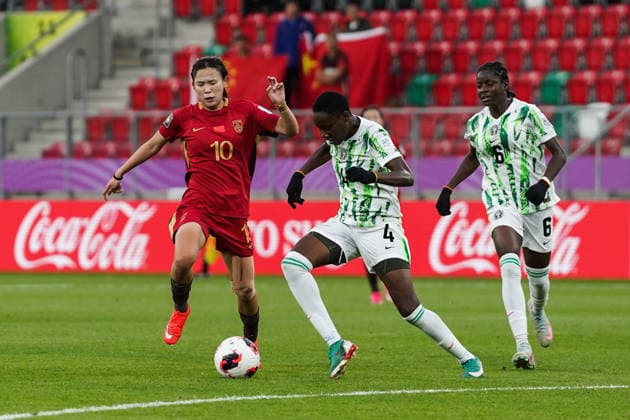 (260911) -- SOSNOWIEC, Sept. 11, 2026 -- Zhou Xinyi (L) of China vies with Onyedikachi Ekezie (C) and Queen Joseph of Nigeria during the Group F match between China and Nigeria at the FIFA U20 Women s World Cup Poland 2026 in Sosnowiec, Poland, Sept. 10, 2026. ) (SP)POLAND-SOSNOWIEC-FOOTBALL-FIFA U20 WOMEN S WORLD CUP-CHINA VS NIGERIA PengxZiyang 