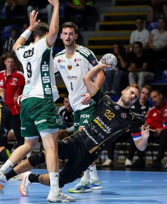 Partizan v Fuchse Berlin - EHF Champions League Ivan Micic (R) of Partizan in action against Frederik SImak (L) and Lauro Pichiri (R) during the EHF Champions League Season 2026 2027 Group Phase match between RK Partizan v Fuchse Berlin at Aleksandar Nikolic Hall on September 10, 2026 in Belgrade, Serbia. Belgrade Serbia Copyright: xSrdjanxStevanovicx x