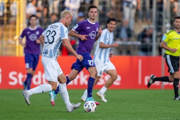 Lasse Fassmann 33 (TSV 1860 Muenchen), Michael Schaefer 27 (TSV Schwaben Augsburg), TSV 1860 Muenchen vs. TSV Schwaben Augsburg, Fussball, Regionalliga Bayern, 8. Spieltag, 11.09.2026 DFB regulations prohibit any use of photographs as image sequences and or quasi-video Muenchen Bayern Deutschland