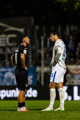 3.Liga: FC Viktoria Köln - Hansa Rostock; 11.09.2026 Taylan Duman (FC Viktoria Köln, 8), Ahmet Gürleyen (Hansa Rostock, 15) nach dem Spiel. 3.Liga: FC Viktoria Köln - Hansa Rostock; Sportpark Höhenberg, Köln; 11.09.2026 DFB regulations prohibit any use of photographs as image sequences and or quasi video. Copyright: xBEAUTIFULxSPORTS Buriakovx