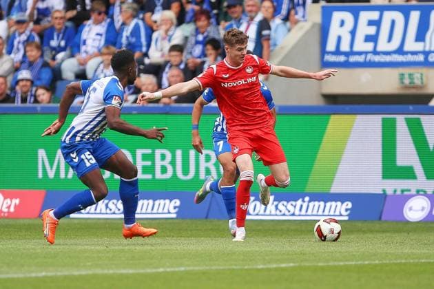 Magdeburg, Sachsen-Anhalt, Deutschland, 12.09.2026: Avnet Arena: 5. Spieltag, Saison 2026 27, 2. Fußball-Bundesliga: 1. FC Magdeburg - 1. FC Kaiserslautern: L-R: Daniel Heber (15, 1. FC Magdeburg), Herbert Bockhorn (7, 1. FC Magdeburg), Alex Murphy (3, 1. FC Kaiserslautern) *** Magdeburg, Saxony-Anhalt, Germany, September 12, 2026, Avnet Arena, Matchday 5, 2026–27 Season, 2. Bundesliga: 1. FC Magdeburg vs. 1. FC Kaiserslautern; Referee: Daniel Heber 15, 1 FC Magdeburg, Herbert Bockhorn 7, 1 FC Magdeburg, Alex Murphy 3, 1 FC Kaiserslautern Copyright: xdtsxNachrichtenagenturx dts_134189