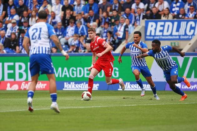 Magdeburg, Sachsen-Anhalt, Deutschland, 12.09.2026: Avnet Arena: 5. Spieltag, Saison 2026 27, 2. Fußball-Bundesliga: 1. FC Magdeburg - 1. FC Kaiserslautern: L-R: Falko Michel (21, 1. FC Magdeburg), Alex Murphy (3, 1. FC Kaiserslautern), Herbert Bockhorn (7, 1. FC Magdeburg), Daniel Heber (15, 1. FC Magdeburg) *** Magdeburg, Saxony-Anhalt, Germany, September 12, 2026, Avnet Arena, Matchday 5, 2026–27 Season, 2. Bundesliga: 1. FC Magdeburg vs. 1. FC Kaiserslautern, Referee: Falko Michel, 21, 1 FC Magdeburg, Alex Murphy 3, 1 FC Kaiserslautern, Herbert Bockhorn 7, 1 FC Magdeburg, Daniel Heber 15, 1 FC Magdeburg Copyright: xdtsxNachrichtenagenturx dts_134186