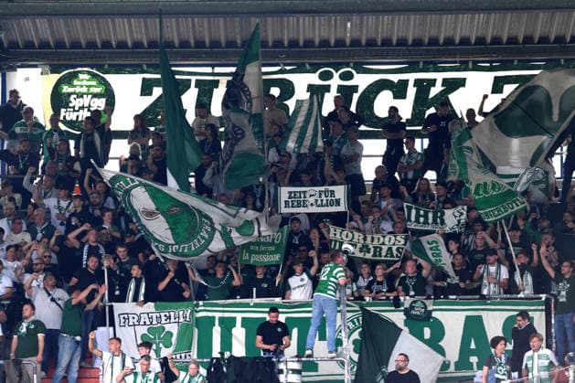 Fans Greuther Fuerth mit Flaggen Bannern waehrend des Spiels der 2. Bundesliga zwischen VfL Bochum und SpVgg Greuther Fuerth, Vonovia Ruhrstadion am 12. September 2026 in Bochum, Deutschland. (Foto von Ralf Treese DeFodi Images) +++ Fans Greuther Fuerth with flags banner during the 2nd Bundesliga match between VfL Bochum and SpVgg Greuther Fuerth at Vonovia Ruhrstadion on September 12, 2026 in Bochum, Germany. (Photo by Ralf Treese DeFodi Images) DFB DFL REGULATIONS PROHIBIT ANY USE OF PHOTOGRAPHS AS IMAGE SEQUENCES AND OR QUASI-VIDEO. (Photo by Ralf Treese DeFodi Images) - *** Greuther Fürth fans with flags and banners during the 2. Bundesliga match between VfL Bochum and SpVgg Greuther Fürth, Vonovia Ruhrstadion on September 12, 2026, in Bochum, Germany. Photo by Ralf Treese, DeFodi Images. Greuther Fürth fans with flags and banners during the 2nd Bundesliga match between VfL Bochum and SpVgg Greuther Fürth at Vonovia Ruhrstadion on September 12, 2026 in Bochum, Germany. Photo by Ralf Treese, DeFodi Images. DFB and DFL regulations prohibit any use of photographs as image sequences and or quasi-video. Photo by Ralf Treese, DeFodi Images.