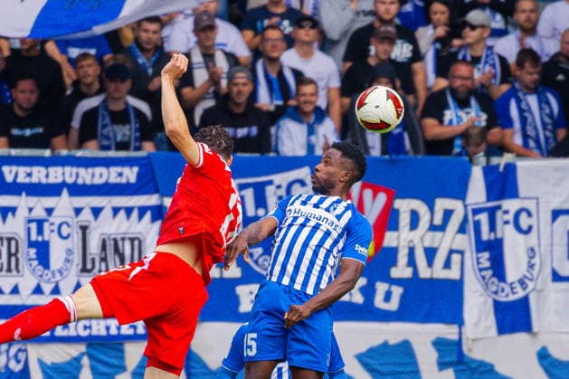 Deutschland: 2.Bundesliga, Saison 2026 2027, 12.09.2026, 5. Spieltag,1.FC Magdeburg vs 1. FC Kaiserslautern, Avnet Arena : Faride Alidou (Holstein Kiel, 17) im Kopfball Duell gegen Daniel Heber (1.FC Magdeburg, 15) *** Germany 2. Bundesliga, 2026–2027 Season, September 12, 2026, Matchday 5, 1. FC Magdeburg vs. 1. FC Kaiserslautern, Avnet Arena Faride Alidou Holstein Kiel, 17 in a header duel against Daniel Heber of 1. FC Magdeburg, 15 Copyright: xMichellexLukax