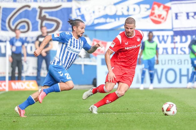 12.09.2026, xgox, Fussball - 2.Bundesliga 1.FC Magdeburg - 1.FC Kaiserslautern emspor, v.l. Baris Atik (Magdeburg, 23), Jan Elvedi (Kaiserslautern, 33) Zweikampf, Duell, Kampf, tackle (DFL DFB REGULATIONS PROHIBIT ANY USE OF PHOTOGRAPHS as IMAGE SEQUENCES and or QUASI-VIDEO) Magdeburg *** September 12, 2026, xgox, Soccer 2. Bundesliga: 1. FC Magdeburg vs. 1. FC Kaiserslautern (emspor), from left: Baris Atik (Magdeburg), 23, Jan Elvedi, Kaiserslautern, 33, tackle, duel, battle, DFL DFB REGULATIONS PROHIBIT ANY USE OF PHOTOGRAPHS as IMAGE SEQUENCES and or QUASI-VIDEO, Magdeburg