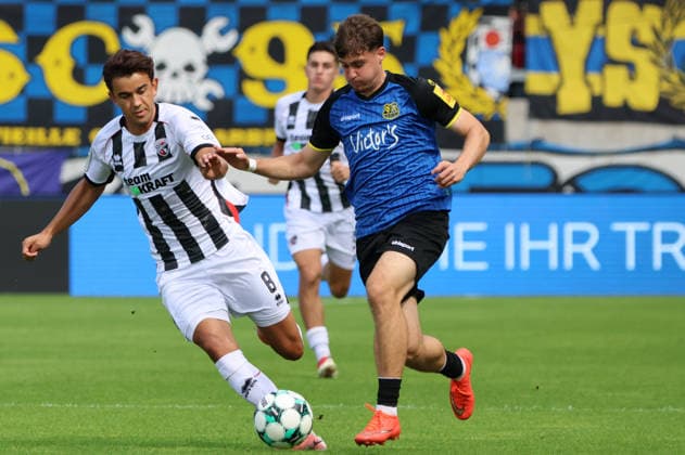 12.09.2026, Fussball, Herren, 3. Liga, Saison 2026 2027, 1. FC Saarbrücken - FC Ingolstadt 04, Alexander Staff (1. FC Saarbrücken), Fredrik Carlsen (FC Ingolstadt 04) Saarbrücken Ludwigsparkstadion Saarland Deutschland (DEU) Copyright: xSebastianxBachx