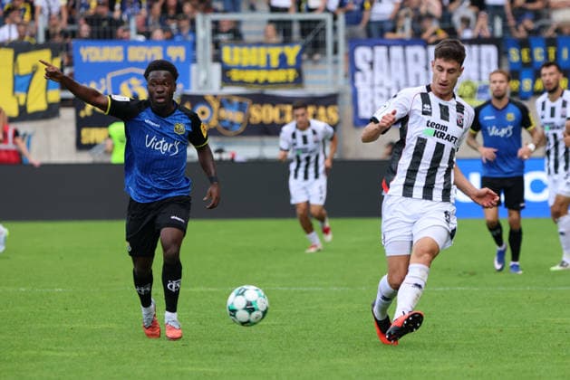12.09.2026, Fussball, Herren, 3. Liga, Saison 2026 2027, 1. FC Saarbrücken - FC Ingolstadt 04, Kelsey Owusu (1. FC Saarbrücken), Georgios Antzoulas (FC Ingolstadt 04) Saarbrücken Ludwigsparkstadion Saarland Deutschland (DEU) Copyright: xSebastianxBachx