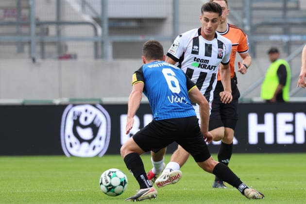 12.09.2026, xrekx, Fussball 3.Liga, 1.FC Saarbruecken - FC Ingolstadt 04 v.l. Patrick Sontheimer (1.FC Saarbruecken) Emre Gül Guel (FC Ingolstadt 04) Saarbruecken