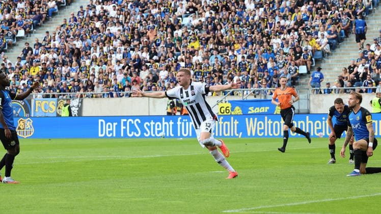 12.09.2026, xrekx, Fussball 3.Liga, 1.FC Saarbruecken - FC Ingolstadt 04 v.l. Torjubel nach dem Tor zum celebrating the goal celebrate 0:1 durch Lars Lokotsch (FC Ingolstadt 04) Saarbruecken