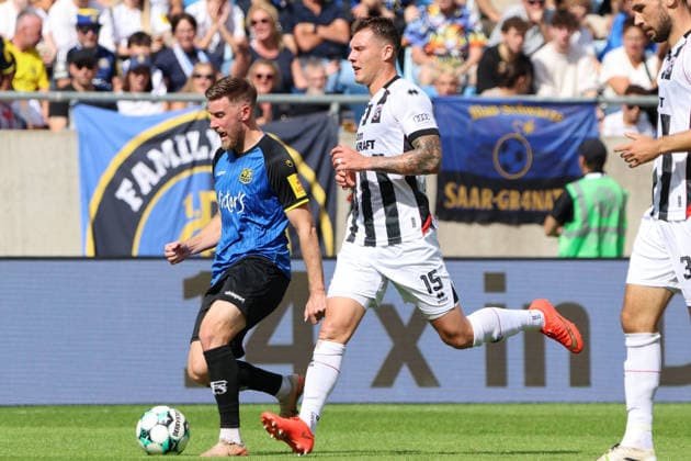 12.09.2026, Fussball, Herren, 3. Liga, Saison 2026 2027, 1. FC Saarbrücken - FC Ingolstadt 04, Christian Kühlwetter (1. FC Saarbrücken), Jonas Scholz (FC Ingolstadt 04) Saarbrücken Ludwigsparkstadion Saarland Deutschland (DEU) Copyright: xSebastianxBachx