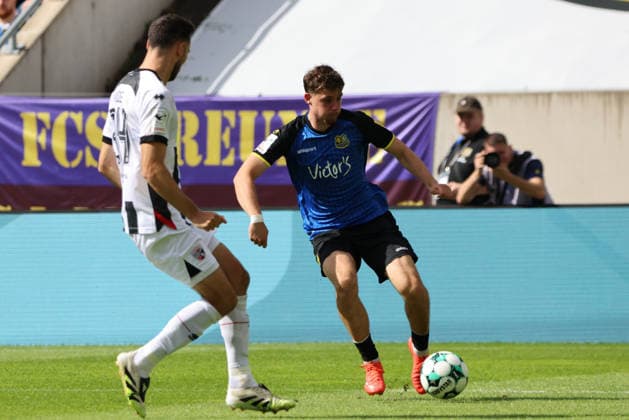 12.09.2026, Fussball, Herren, 3. Liga, Saison 2026 2027, 1. FC Saarbrücken - FC Ingolstadt 04, Alexander Staff (1. FC Saarbrücken), Lukas Fröde (FC Ingolstadt 04) Saarbrücken Ludwigsparkstadion Saarland Deutschland (DEU) Copyright: xSebastianxBachx