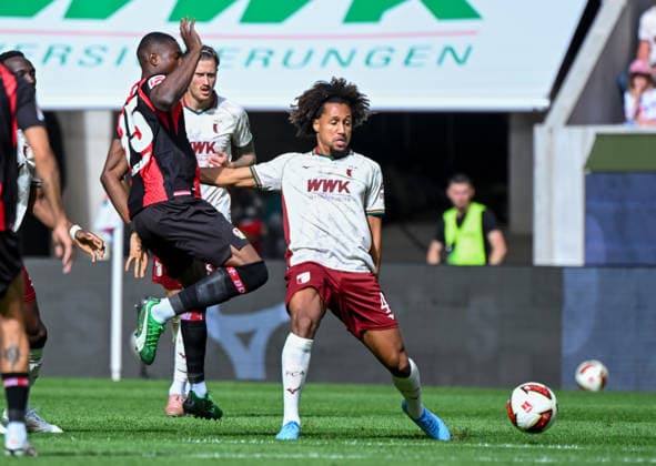 12.09.2026, xemx, Fussball 1.Bundesliga, FC Augsburg - Bayer 04 Leverkusen v.l. Christian Kofane (Bayer 04 Leverkusen), Han-Noah Massengo (FC Augsburg) Zweikampf, Aktion, action, battle for the ball (DFL DFB REGULATIONS PROHIBIT ANY USE OF PHOTOGRAPHS as IMAGE SEQUENCES and or QUASI-VIDEO) Augsburg *** September 12, 2026, xemx, Soccer, Bundesliga 1, FC Augsburg vs. Bayer 04 Leverkusen, featuring Christian Kofane of Bayer 04 Leverkusen, Han Noah Massengo, FC Augsburg, tackle, action, battle for the ball. DFL and DFB regulations prohibit any use of photographs as image sequences and or quasi-video. Augsburg