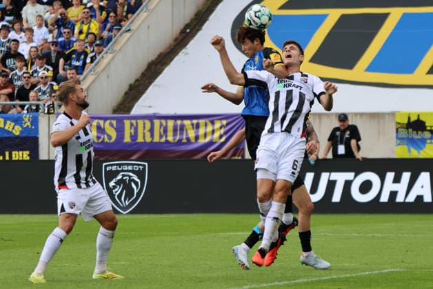 12.09.2026, Fussball, Herren, 3. Liga, Saison 2026 2027, 1. FC Saarbrücken - FC Ingolstadt 04, Seung-Joon Lee (1. FC Saarbrücken), Georgios Antzoulas (FC Ingolstadt 04) Saarbrücken Ludwigsparkstadion Saarland Deutschland (DEU) Copyright: xSebastianxBachx