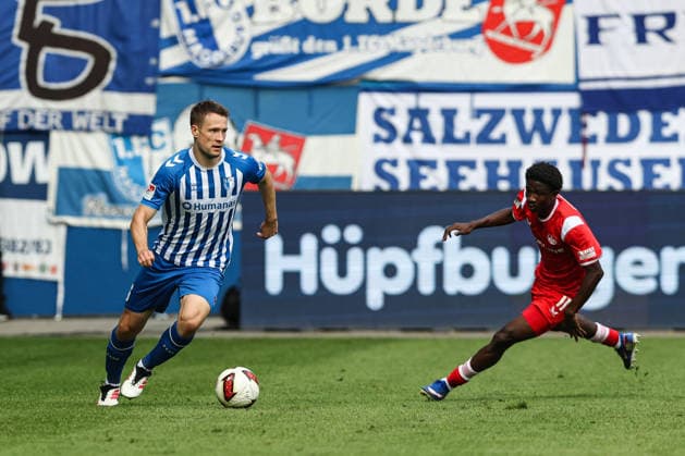 Paul Jaeckel (1. FC Magdeburg,6) gegen Ibrahim Kanate (1. FC Kaiserslautern,11) - 2. Fußball Bundesliga Saison 2026-2027 1. FC Magdeburg vs 1. FC Kaiserslautern in der Avnet Arena in Magdeburg - Aktion,Fußball,Mann,Männer,Deutschland,12.09.2026 *** Paul Jaeckel (1 FC Magdeburg, No. 6) vs. Ibrahim Kanate (1 FC Kaiserslautern, No. 11) – 2026–2027 Bundesliga Season: 1 FC Magdeburg vs. 1 FC Kaiserslautern at the Avnet Arena in Magdeburg – Action, Soccer, Man,Men, Germany, September 12, 2026