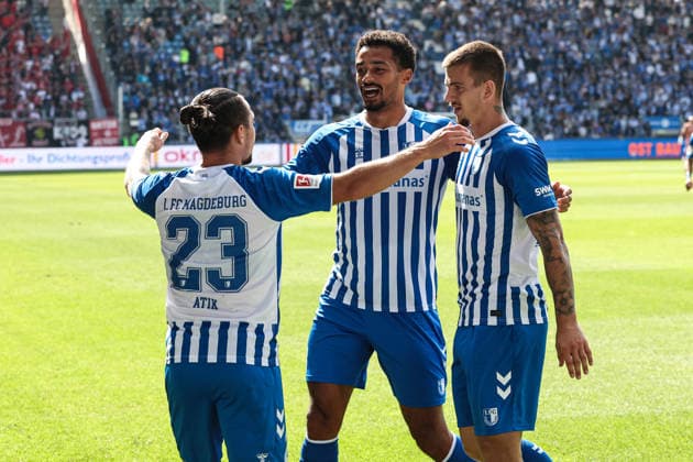 Torjubel - Torschütze Baris Atik (1. FC Magdeburg,23) trifft zum 3-0 mit Emmanuel Iyoha (1. FC Magdeburg,8) und Mateusz Zukowski (1. FC Magdeburg,22), das Tor wird nach Videoüberprüfung von Referee Marc Philip Eckermann wegen eines vorherigen Foulspiels aberkannt - 2. Fußball Bundesliga Saison 2026-2027 1. FC Magdeburg vs 1. FC Kaiserslautern in der Avnet Arena in Magdeburg - Aktion,Fußball,Mann,Männer,Deutschland,12.09.2026 *** Goal celebration: Goal scorer Baris Atik (1 FC Magdeburg, 23) scores to make it 3-0, assisted by Emmanuel Iyoha (1 FC Magdeburg, 8) and Mateusz Zukowski (1 FC Magdeburg, 22), The goal is disallowed by referee Marc Philip Eckermann following a video review due to a previous foul. 2. Bundesliga, 2026–2027 season: 1. FC Magdeburg vs. 1. FC Kaiserslautern at the Avnet Arena in Magdeburg. Action, soccer, man,Men, Germany, September 12, 2026