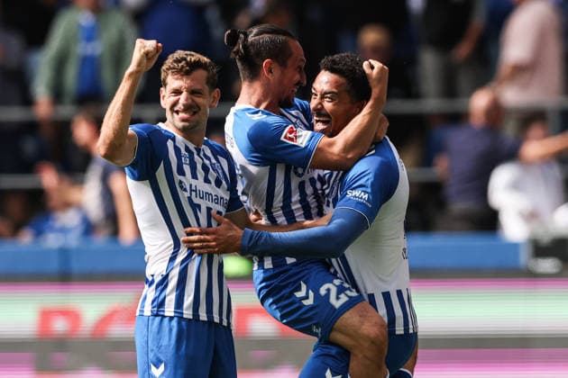 Torjubel - Torschütze Emmanuel Iyoha (1. FC Magdeburg,8) trifft zum 1-0 mit Baris Atik (1. FC Magdeburg,23) und Alexander Nollenberger (1. FC Magdeburg,17) - 2. Fußball Bundesliga Saison 2026-2027 1. FC Magdeburg vs 1. FC Kaiserslautern in der Avnet Arena in Magdeburg - Aktion,Fußball,Mann,Männer,Deutschland,12.09.2026 *** Goal celebration: Goal scorer Emmanuel Iyoha (1 FC Magdeburg, 8) scores the 1-0 goal with Baris Atik (1 FC Magdeburg, 23) and Alexander Nollenberger (1 FC Magdeburg,17, 2026–2027 Bundesliga season: 1 FC Magdeburg vs. 1 FC Kaiserslautern at the Avnet Arena in Magdeburg; action, soccer, man, men, Germany, September 12, 2026