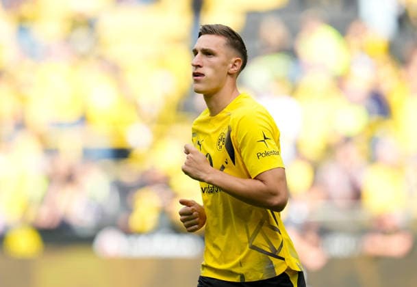 Nico Schlotterbeck (Borussia Dortmund, 4) waermt sich vor dem Spiel auf. GER, Borussia Dortmund vs SC Paderborn 07, 1. Bundesliga, 3. Spieltag, Saison 2026-27, Signal Iduna Park, Dortmund, 12.09.2026 DFL REGULATIONS PROHIBIT ANY USE OF PHOTOGRAPHS AS IMAGE SEQUENCES AND OR QUASI-VIDEO GER, Borussia Dortmund vs SC Paderborn 07, 1. Bundesliga, 3. Spieltag, Saison 2026-27, 12.09.2026 Dortmund *** Nico Schlotterbeck of Borussia Dortmund, 4, warms up before the game in Germany: Borussia Dortmund vs. SC Paderborn 07, 1 Bundesliga, Matchday 3, 2026–27 season, Signal Iduna Park, Dortmund, September 12, 2026. DFL regulations prohibit any use of photographs as image sequences and or quasi-video. GER, Borussia Dortmund vs. SC Paderborn 07, Bundesliga 1, Matchday 3, 2026–27 season, September 12, 2026, Dortmund Copyright: xEibner-Pressefoto ScottxColemanx EP_SCN