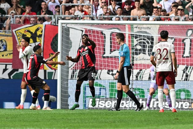 1. Fussball Bundesliga: FC Augsburg - Bayer 04 Leverkusen, 12.09.2026 AUGSBURG, GERMANY; 12. SEPTEMBER: Jubel der Gäste nach dem Treffer zum 0-1 durch Christian KOFANE (Bayer Leverkusen 35) Tor Torschuetze Freude Happy während dem Match der Bundesliga zwischen dem FC Augsburg und Bayer 04 Leverkusen am 3. Spieltag in der WWK-Arena DFL REGULATIONS PROHIBIT ANY USE OF PHOTOGRAPHS AS IMAGE SEQUENCES AND OR QUASI-VIDEO *** 1 Soccer Bundesliga FC Augsburg vs. Bayer 04 Leverkusen, September 12, 2026, AUGSBURG, GERMANY September 12: The visiting fans celebrate after Christian KOFANE scores the 0–1 goal for Bayer Leverkusen. Goal, goal scorer, joy, happy during the Bundesliga match between FC Augsburg and Bayer 04 Leverkusen on Matchday 3 at the WWK Arena. DFL REGULATIONS PROHIBIT ANY USE OF PHOTOGRAPHS AS IMAGE SEQUENCES AND OR QUASI-VIDEO Copyright: xBEAUTIFULxSPORTS Goldbergx