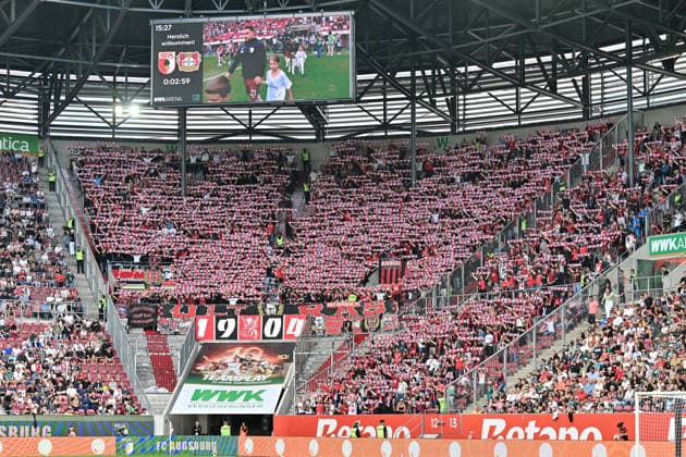 1. Fussball Bundesliga: FC Augsburg - Bayer 04 Leverkusen, 12.09.2026 AUGSBURG, GERMANY; 12. SEPTEMBER: im Bild der gut gefüllte Gästeblock in Augsburg während dem Match der Bundesliga zwischen dem FC Augsburg und Bayer 04 Leverkusen am 3. Spieltag in der WWK-Arena DFL REGULATIONS PROHIBIT ANY USE OF PHOTOGRAPHS AS IMAGE SEQUENCES AND OR QUASI-VIDEO *** 1 Bundesliga: FC Augsburg vs. Bayer 04 Leverkusen, September 12, 2026, AUGSBURG, GERMANY September 12: A photo showing the well-filled visitors’ section in Augsburg during the Bundesliga match between FC Augsburg and Bayer 04 Leverkusen on Matchday 3 at the WWK Arena. DFL REGULATIONS PROHIBIT ANY USE OF PHOTOGRAPHS AS IMAGE SEQUENCES AND OR QUASI-VIDEO Copyright: xBEAUTIFULxSPORTS Goldbergx