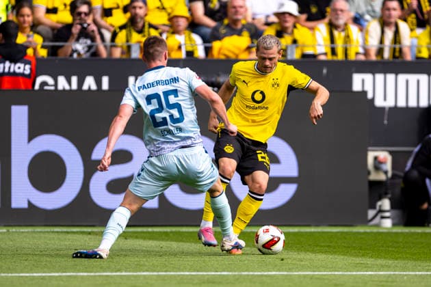 12.09.2026, Fussball, 3. Spieltag der 1. Fussball Bundesliga, Borussia Dortmund - SC Paderborn. v. l. Tjark Scheller (SC Paderborn 07), Julian Ryerson (Borussia Dortmund). Dortmund Signal Iduna Park NRW Deutschland xRHR-FOTO DEx *** September 12, 2026, Soccer, Matchday 3 of the 1. Bundesliga, Borussia Dortmund vs. SC Paderborn 07 (Tjark Scheller), Julian Ryerson, Borussia Dortmund, Signal Iduna Park, North Rhine-Westphalia, Germany, xRHR PHOTO DEx Copyright: DennisxEwert RHR-FOTOx RHR-FOTO DE