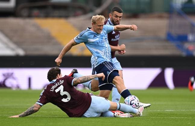 Xaver Schlager of Nottingham Forest is tackled by Victor Lindelöf of Aston Villa Aston Villa v Nottingham Forest, Premier League, Football, Football, Villa Park, Birmingham, UK - 12 Sep 2026Birmingham Villa Park United Kingdom EDITORIAL USE ONLY No use with unauthorised audio, video, data, fixture lists, club league logos or live services. Online in-match use limited to 120 images, no video emulation. No use in betting, games or single club league player publications.  Copyright: xAnnaxGowthorpe Shutterstockx 17144543o