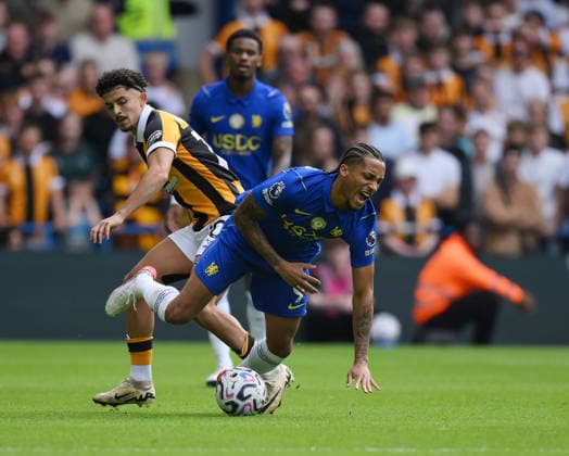 Chelsea v Hull City Premier League Chelsea s Joao Pedro is fouled by Hull City s Mohamed Belloumi during the Premier League match at Stamford Bridge, London 12 09 2026 UK Newspapers OUT Copyright: xDanielxHamburyx FIL-23926-0066