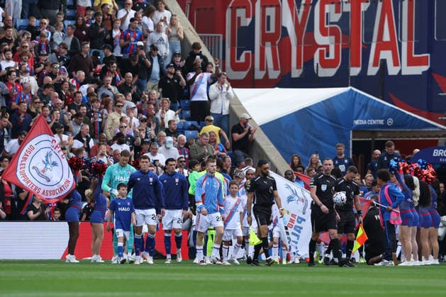 12th September 2026; Selhurst Park, London, England; Premier League Football, Crystal Palace versus Ipswich Town; Crystal Palace match captain Adam Wharton and Ipswich Town match captain Dara O Shea with referee Christopher Kavanagh leading players out for the start of the match KatiexChan
