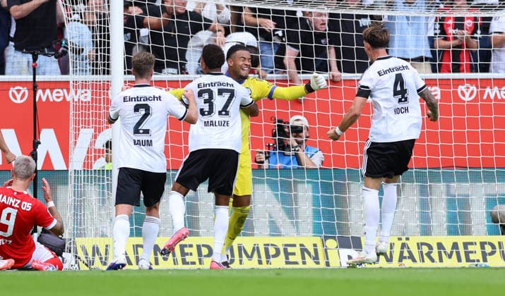 12.09.2026, Fussball Bundesliga, 1. FSV Mainz 05 - Eintracht Frankfurt, v.l., Torwart Noah Atubolu (Eintracht Frankfurt) pariert Elfmeter von Nadiem Amiri (FSV Mainz 05), Jeremiaha Maluze (Eintracht Frankfurt), Robin Koch (Eintracht Frankfurt), Elias Baum (Eintracht Frankfurt) DFL DFB REGULATIONS PROHIBIT ANY USE OF PHOTOGRAPHS AS IMAGE SEQUENCES AND OR QUASI-VIDEO. xdcx *** September 12, 2026, Bundesliga Soccer, 1 FSV Mainz 05 vs. Eintracht Frankfurt, from left: Goalkeeper Noah Atubolu of Eintracht Frankfurt saves a penalty kick by Nadiem Amiri of FSV Mainz 05; Jeremiaha Maluze of Eintracht Frankfurt; Robin Koch (Eintracht Frankfurt), Elias Baum (Eintracht Frankfurt). DFL and DFB regulations prohibit any use of photographs as image sequences and or quasi-video. xdcx Copyright: HMBxMedia Claus