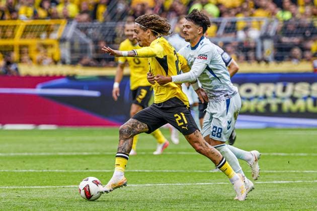 DORTMUND - Fabio Silva of Borussia Dortmund battles for possession with Laurin Ulrich of SC Paderborn 07 during the Bundesliga match between Borussia Dortmund and SC Paderborn 07 at Signal Iduna Park on 12 September 2026 in Dortmund, Germany. MARCEL TER BALS ANP Bundesliga 2026 27 xVIxANPxSportx xMarcelxterxBalsxIVx 568297114 originalFilename: 568297114.jpg