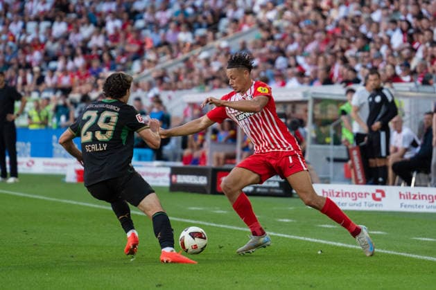 12.09.2026, xjyhynx, Fussball 1.Bundesliga, SC Freiburg - Borussia Mönchengladbach v.l., oe Scally (29, Borussia Mönchengladbach) im Zweikampf gegen Derry Scherhant (7, SC Freiburg) (DFL DFB REGULATIONS PROHIBIT ANY USE OF PHOTOGRAPHS as IMAGE SEQUENCES and or QUASI-VIDEO) Freiburg *** September 12, 2026, xjyhynx, Soccer, Bundesliga 1, SC Freiburg vs. Borussia Mönchengladbach, oe Scally 29, Borussia Mönchengladbach in a tackle against Derry Scherhant 7, SC Freiburg DFL DFB REGULATIONS PROHIBIT ANY USE OF PHOTOGRAPHS as IMAGE SEQUENCES and or QUASI-VIDEO Freiburg