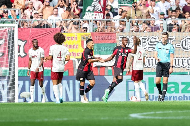 Jubel zum Tor zum 0:1 durch Christian Kofane (Bayer 04 Leverkusen, 35), GER, FC Augsburg vs. Bayer 04 Leverkusen, Fussball, Bundesliga, 3. Spieltag, Saison 2026 2027, 12.09.2026, DFL DFB REGULATIONS PROHIBIT ANY USE OF PHOTOGRAPHS as IMAGE SEQUENCES and or QUASI-VIDEO, GER, FC Augsburg vs. Bayer 04 Leverkusen, Fussball, Bundesliga, 3. Spieltag, Saison 2026 2027, 12.09.2026 Augsburg *** Celebration following Christian Kofane s goal to make it 0–1, Bayer 04 Leverkusen, 35, GER, FC Augsburg vs. Bayer 04 Leverkusen, Soccer, Bundesliga, Matchday 3, 2026–2027 Season, September 12, 2026, DFL and DFB regulations prohibit any use of photographs as image sequences and or quasi-video, GER, FC Augsburg vs. Bayer 04 Leverkusen, Soccer, Bundesliga, Matchday 3, 2026–2027 season, September 12, 2026, Augsburg Copyright: xEibner-Pressefoto JennixMaulx EP_JML