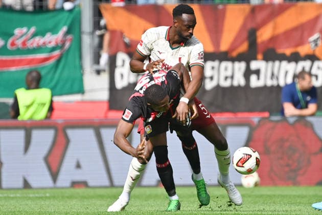 Chrislain MATSIMA (FC AUGSBURG), Aktion,Zweikampf gegen Christian KOFANE (Bayer Leverkusen). Fussball 1. Bundesliga Saison 2026 2027, 3.Spieltag, Spieltag03, FC Augsburg - Bayer 04 Leverkusen am 12.09.2026 , WWK A R E N A. *** Chrislain MATSIMA, FC Augsburg, Action, Tackle against Christian KOFANE, Bayer Leverkusen, Soccer, Bundesliga, 2026–2027 Season, Matchday 3, Matchday 03, FC Augsburg vs. Bayer 04 Leverkusen on September 12, 2026, WWK ARENA