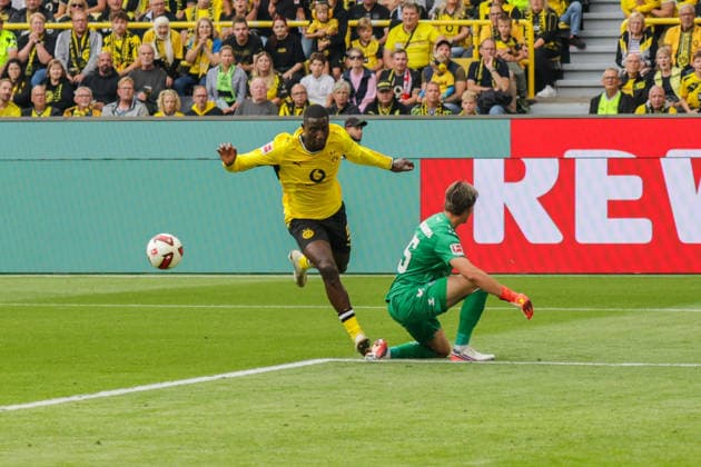 12.09.2026, xgrfx, Fussball 1.Bundesliga, Borussia Dortmund - SC Paderborn 07 v.l. Serhou Guirassy (Borussia Dortmund), Nahuel Noll (SC Paderborn) (DFL DFB REGULATIONS PROHIBIT ANY USE OF PHOTOGRAPHS as IMAGE SEQUENCES and or QUASI-VIDEO) Dortmund *** September 12, 2026, xgrfx, Soccer 1st Bundesliga, Borussia Dortmund vs. SC Paderborn 07, Serhou Guirassy (Borussia Dortmund), Nahuel Noll (SC Paderborn). DFL and DFB regulations prohibit any use of photographs as image sequences and or quasi-video. Dortmund