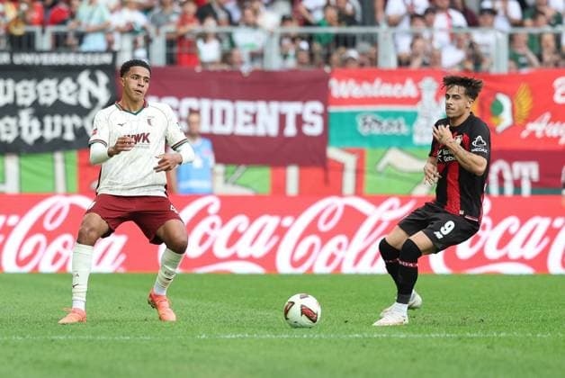 l-r: im Zweikampf, Aktion, mit Noahkai Banks 40 (FC Augsburg), Afonso Moreira 9 (Bayer 04 Leverkusen), FC Augsburg vs. Bayer 04 Leverkusen, Fussball, 1. Bundesliga, 3. Spieltag, 12.09.2026 DFB regulations prohibit any use of photographs as image sequences and or quasi-video Augsburg Bayern Deutschland *** l r in a one-on-one duel, action, featuring Noahkai Banks 40 (FC Augsburg) and Afonso Moreira 9 (Bayer 04 Leverkusen), FC Augsburg vs. Bayer 04 Leverkusen, soccer, Bundesliga 1, Matchday 3, September 12, 2026. DFB regulations prohibit any use of photographs as image sequences and or quasi-video. Augsburg, Bavaria, Germany Copyright: xkolbert-press ChristianxKolbertx