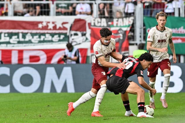 1. Fussball Bundesliga: FC Augsburg - Bayer 04 Leverkusen, 12.09.2026 AUGSBURG, GERMANY; 12. SEPTEMBER: im Duell Fabian RIEDER (FC Augsburg 32) und Ibrahim MAZA (Bayer Leverkusen 30) während dem Match der Bundesliga zwischen dem FC Augsburg und Bayer 04 Leverkusen am 3. Spieltag in der WWK-Arena DFL REGULATIONS PROHIBIT ANY USE OF PHOTOGRAPHS AS IMAGE SEQUENCES AND OR QUASI-VIDEO *** 1 Soccer Bundesliga FC Augsburg vs. Bayer 04 Leverkusen, September 12, 2026, AUGSBURG, GERMANY, September 12: A duel between Fabian RIEDER (FC Augsburg, 32) and Ibrahim MAZA (Bayer Leverkusen, 30) during the Bundesliga match between FC Augsburg and Bayer 04 Leverkusen on Matchday 3 at the WWK Arena. DFL REGULATIONS PROHIBIT ANY USE OF PHOTOGRAPHS AS IMAGE SEQUENCES AND OR QUASI-VIDEO Copyright: xBEAUTIFULxSPORTS Goldbergx