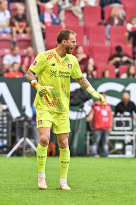 1. Fussball Bundesliga: FC Augsburg - Bayer 04 Leverkusen, 12.09.2026 AUGSBURG, GERMANY; 12. SEPTEMBER: im Bild Mark FLEKKEN (Bayer Leverkusen 1) Einzelfoto Freisteller während dem Match der Bundesliga zwischen dem FC Augsburg und Bayer 04 Leverkusen am 3. Spieltag in der WWK-Arena DFL REGULATIONS PROHIBIT ANY USE OF PHOTOGRAPHS AS IMAGE SEQUENCES AND OR QUASI-VIDEO *** 1 Soccer Bundesliga FC Augsburg vs. Bayer 04 Leverkusen, September 12, 2026 AUGSBURG, GERMANY September 12. Photo by Mark FLEKKEN. Bayer Leverkusen 1. Single photo (cropped) taken during the Bundesliga match between FC Augsburg and Bayer 04 Leverkusen on Matchday 3 at the WWK Arena. DFL REGULATIONS PROHIBIT ANY USE OF PHOTOGRAPHS AS IMAGE SEQUENCES OR QUASI-VIDEO Copyright: xBEAUTIFULxSPORTS Goldbergx