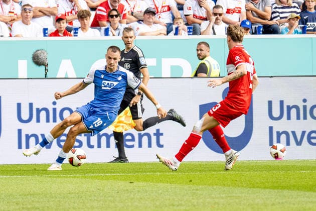 12.09.2026, xdaymx, Fussball 1.Bundesliga, TSG 1899 Hoffenheim - VfB Stuttgart. vl. Tim Lemperle (TSG Hoffenheim) im Zweikampf mit Ramon Hendriks (VfB Stuttgart). (DFL DFB REGULATIONS PROHIBIT ANY USE OF PHOTOGRAPHS as IMAGE SEQUENCES and or QUASI-VIDEO) Sinsheim *** September 12, 2026, xdaymx, Soccer, Bundesliga 1, TSG 1899 Hoffenheim vs. VfB Stuttgart, photo by Tim Lemperle: TSG Hoffenheim in a tackle with Ramon Hendriks of VfB Stuttgart. DFL and DFB regulations prohibit any use of photographs as image sequences and or quasi-video.heim