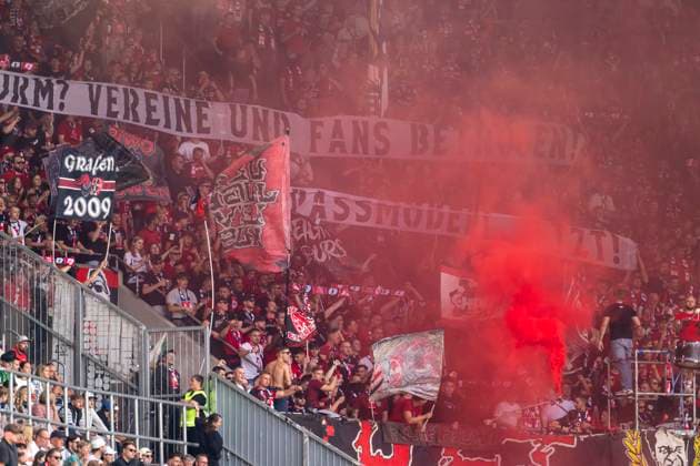 12.09.2026, Fussball Bundesliga 2026 2027, 3.Spieltag, FC Augsburg - Bayer Leverkusen, in der WWK-Arena Augsburg, Rauchbomben im Block der Leverkusener Fans ***DFL and DFB regulations prohibit any use of photographs as image sequences and or quasi-video.*** *** September 12, 2026, 2026–2027 Bundesliga Season, Matchday 3, FC Augsburg vs. Bayer Leverkusen, at the WWK Arena in Augsburg, smoke bombs in the Leverkusen fans’ section ***DFL and DFB regulations prohibit any use of photographs as image sequences and or quasi-video***