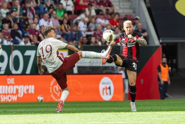 Robin Fellhauer (FC Augsburg) und Aleix Garcia (Bayer 04 Leverkusen) v-l im Zweikampf, FC Augsburg vs. Bayer 04 Leverkusen, Fußball-Bundesliga, Fussball, 1. Bundesliga, 03. Spieltag, 12.09.2026 DFB regulations prohibit any use of photographs as image sequences and or quasi-video *** Robin Fellhauer (FC Augsburg) and Aleix Garcia (Bayer 04 Leverkusen) in a tackle, FC Augsburg vs. Bayer 04 Leverkusen, Bundesliga Soccer, Soccer, Bundesliga 1, Matchday 3, September 12, 2026. DFB regulations prohibit any use of photographs as image sequences and or quasi-video. Copyright: xkolbert-press PeterxFastlx