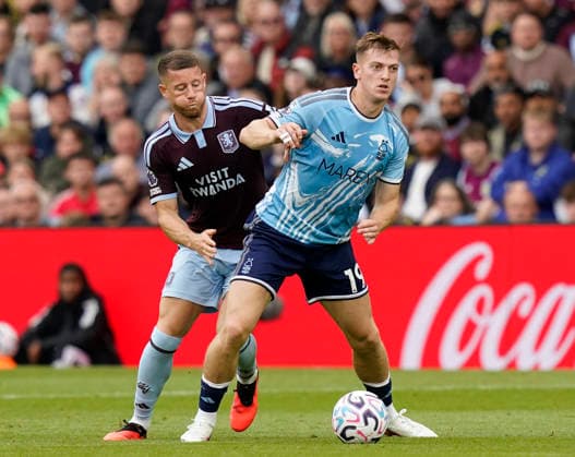 Birmingham, England, 12th September 2026. Ross Barkley of Aston Villa tackles Liam Delap of Nottingham Forest during the Aston Villa vs Nottingham Forest Premier League match at Villa Park, Birmingham. Picture credit should read: Andrew Yates Sportimage EDITORIAL USE ONLY. No use with unauthorised audio, video, data, fixture lists, club league logos or live services. Online in-match use limited to 120 images, no video emulation. No use in betting, games or single club league player publications. SPI_005_AY_Villa_Forest SPI-4990-0005
