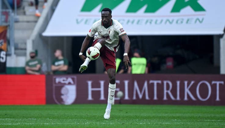 12.09.2026, xemx, Fussball 1.Bundesliga, FC Augsburg - Bayer 04 Leverkusen v.l. Chrislain Matsima (FC Augsburg) Aktion, Einzelaktion, Einzelbild, Freisteller, Ganzkoerperaufnahme, ganze Figur (DFL DFB REGULATIONS PROHIBIT ANY USE OF PHOTOGRAPHS as IMAGE SEQUENCES and or QUASI-VIDEO) Augsburg *** September 12, 2026, xemx, Soccer, Bundesliga 1, FC Augsburg vs. Bayer 04 Leverkusen, featuring Chrislain Matsima of FC Augsburg in action, individual play, single frame, cropped image, Full-body shot, full figure DFL DFB REGULATIONS PROHIBIT ANY USE OF PHOTOGRAPHS as IMAGE SEQUENCES and or QUASI-VIDEO Augsburg